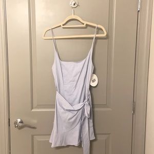 Light blue, mini wrap dress.